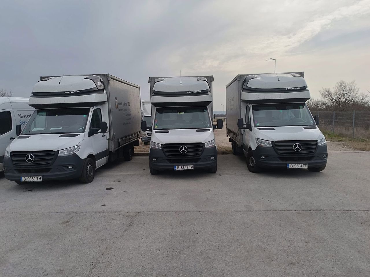 Three Space 4 Time Ltd Mercedes Sprinter removal trucks parked side by side