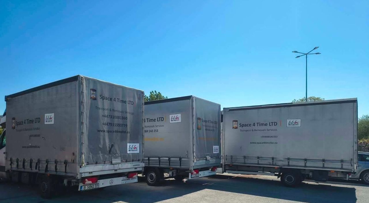 Space 4 Time Ltd curtain-side trucks with company branding