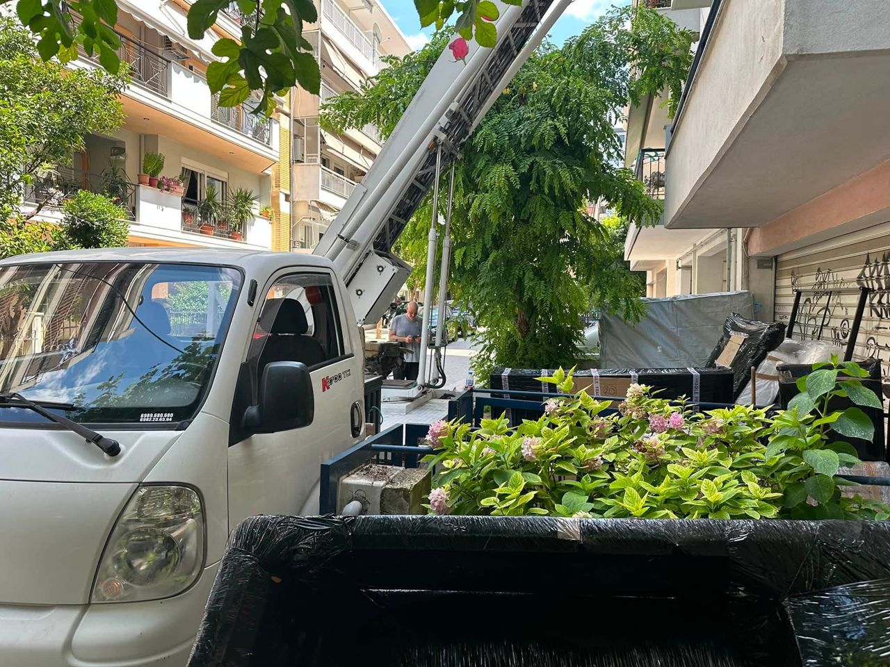 Space 4 Time Ltd removal truck parked at a customer's home